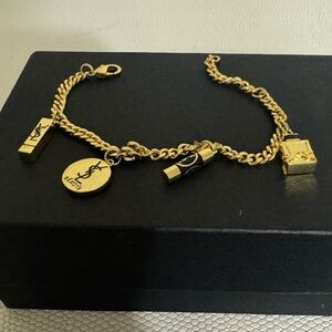 Yves Saint Laurent Gold Charm Bracelet